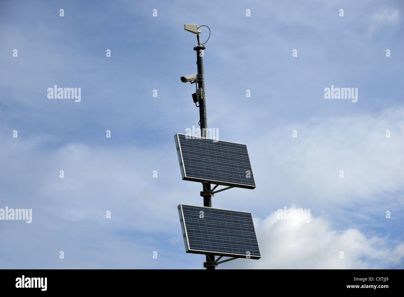 A remote highway camera with a solar panel Stock Photo