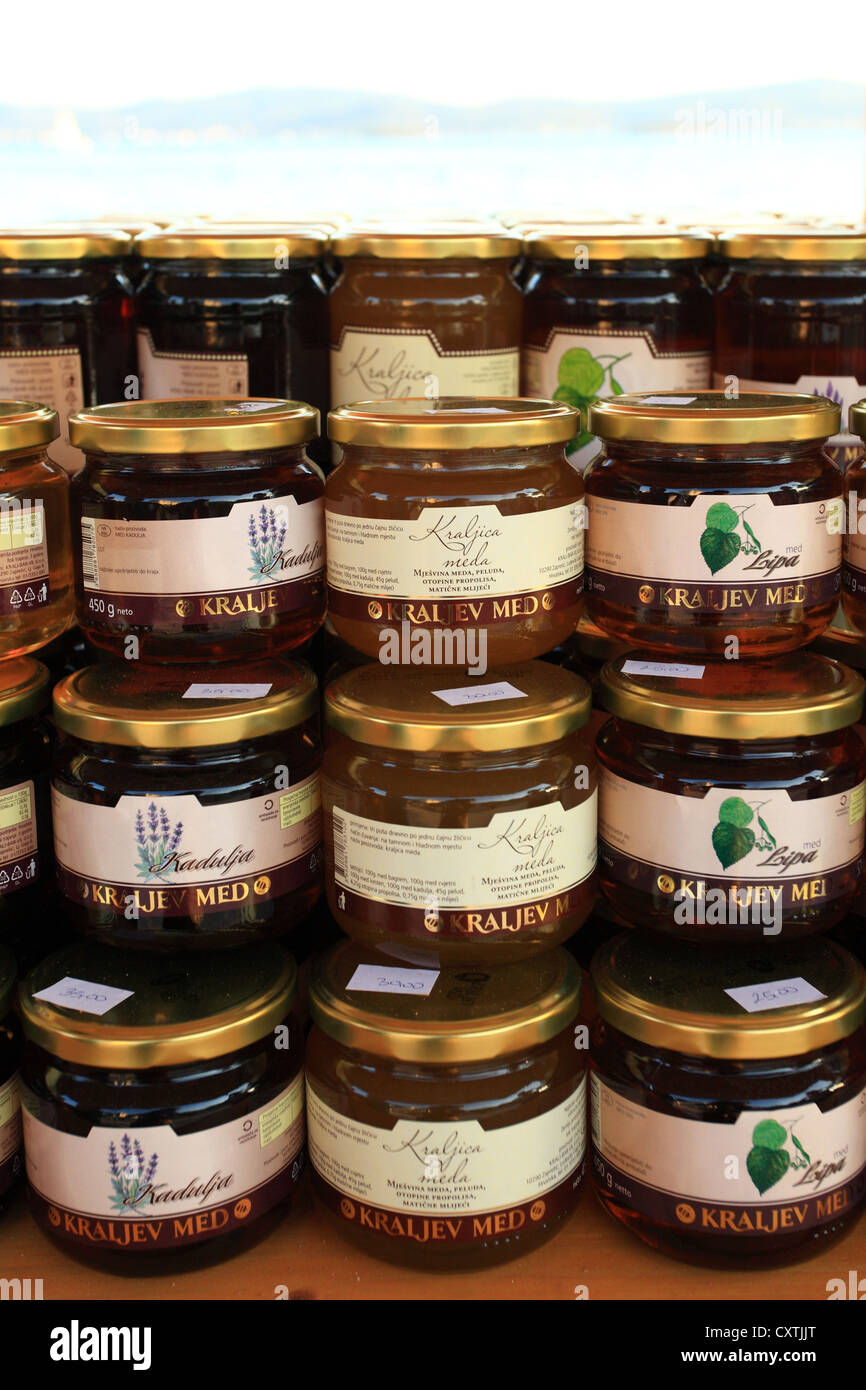 Jars of honey on display at the market stall in Sveti Filip i Jakov ...