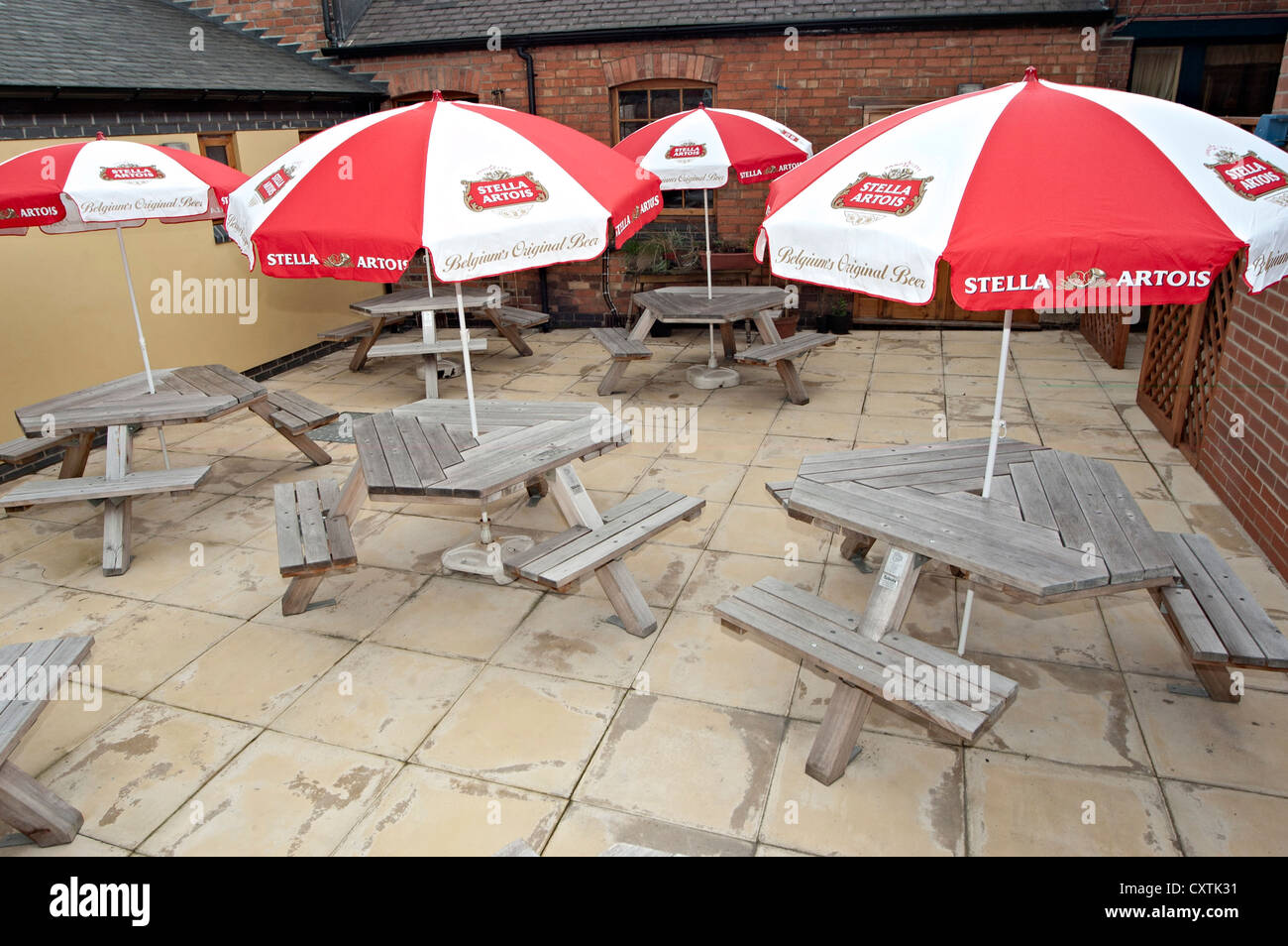 the old space inn Pub garden bench Stock Photo - Alamy
