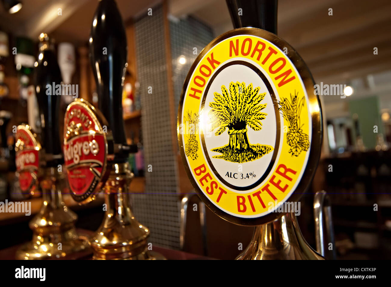 a hook norton beer pump at a uk bar in a pub Stock Photo Alamy