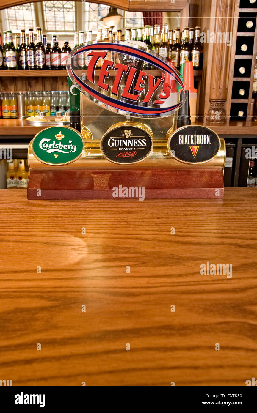 talbot and falcon pub Guinness and tetleys beer pumps Stock Photo