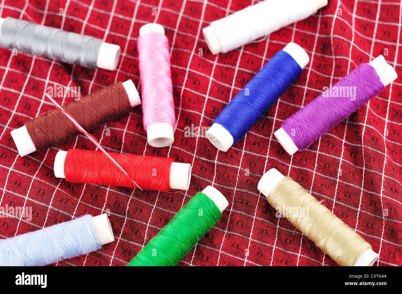 bobbins of thread on Fabric Stock Photo Alamy