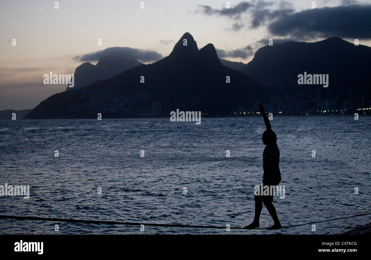 Slackline between Arpoador Rocks Ipanema Rio de Janeiro Brazil Stock Photo