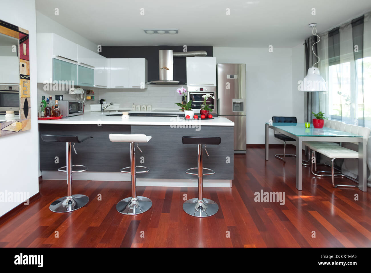 Beautiful modern kitchen in designer house Stock Photo