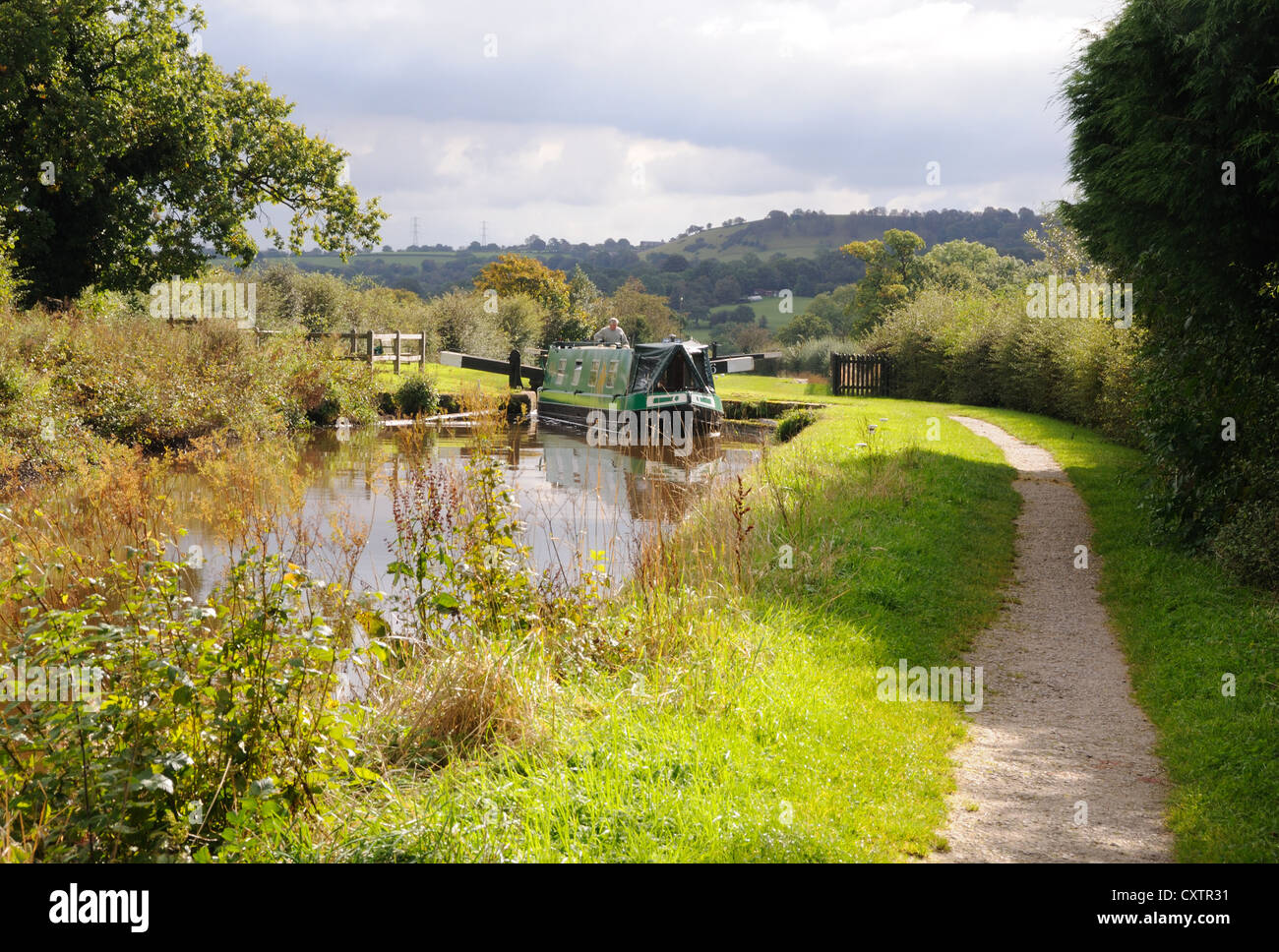 Narrowboat 'Sadie' leaves Lock No. 6 on the Macclesfield Canal near