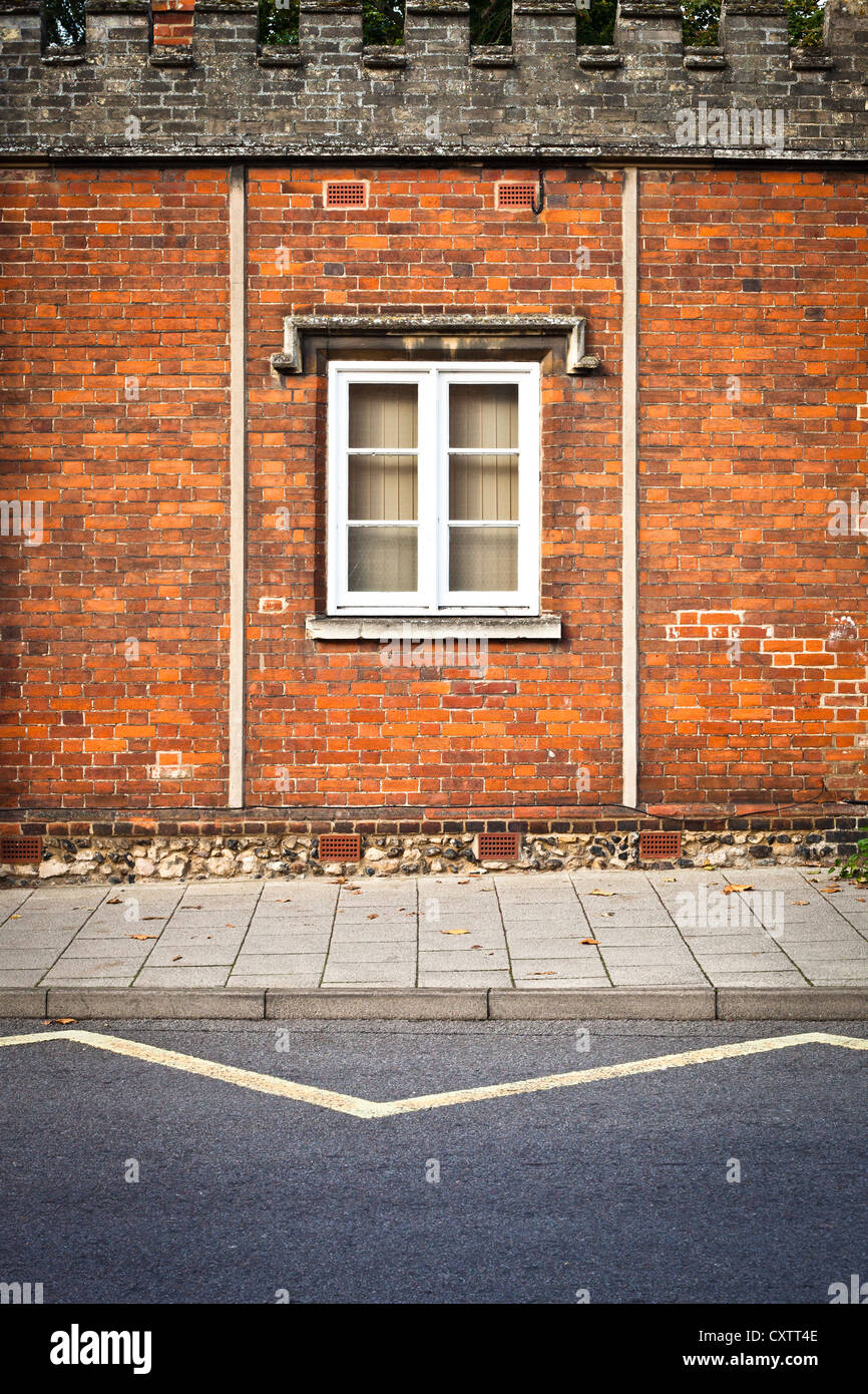 A window in a red brick wall in an english building Stock Photo - Alamy