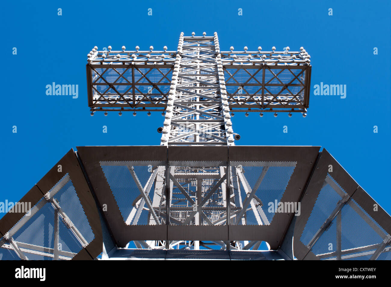 Illuminated Giant Cross On The Summit Of Mount Royal Park, Montreal, Canada during a summer day Stock Photo