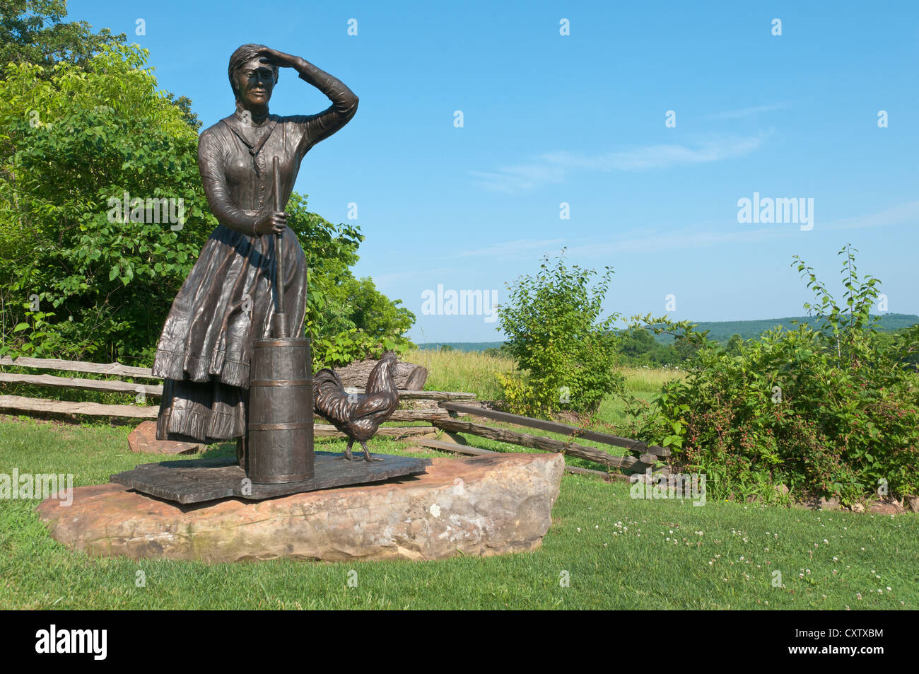 Oklahoma, Tulsa, Gilcraese Museum, Pioneer Garden, Frontier Woman, bronze sculpture by Jay O'Meilia. Stock Photo