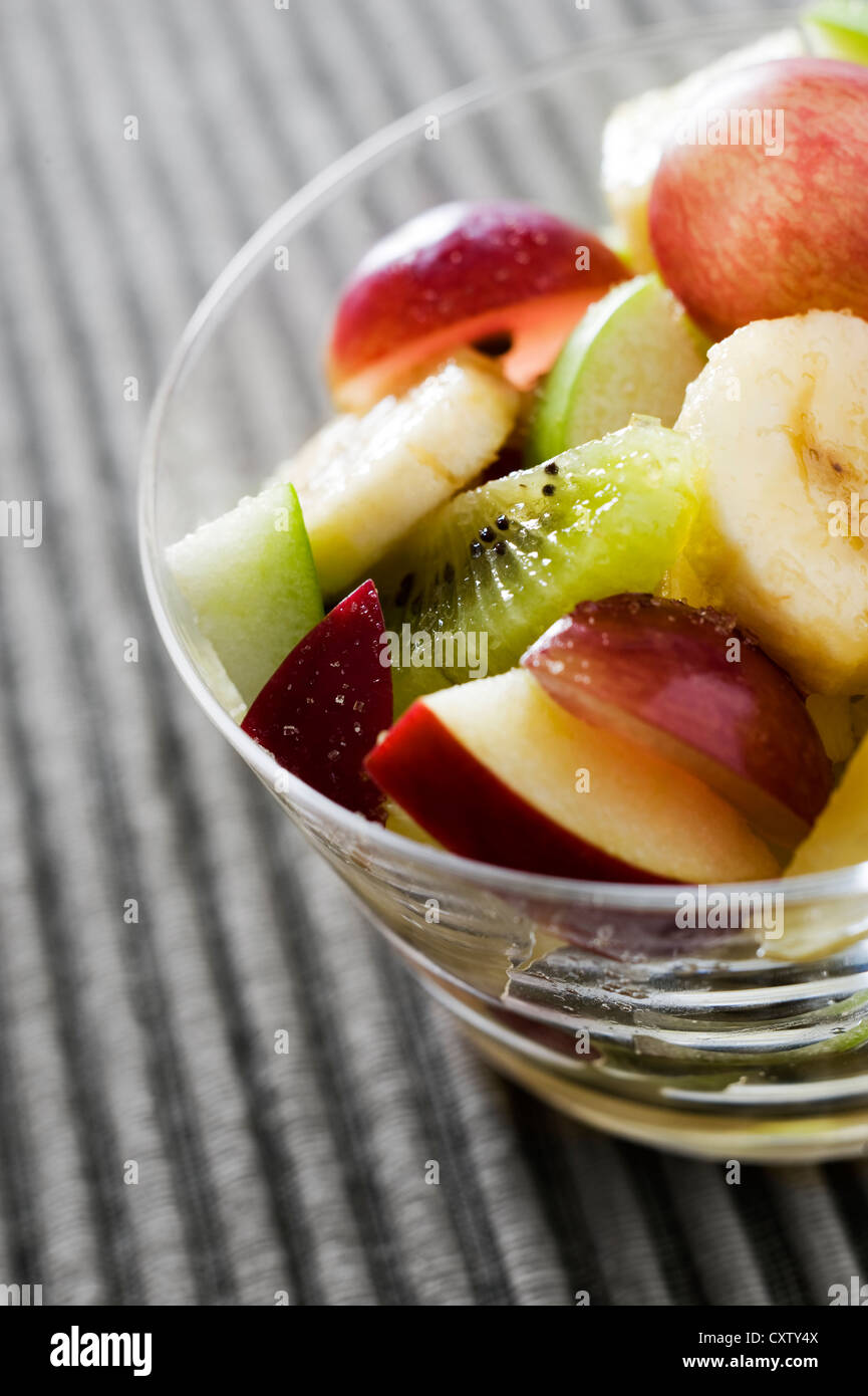 fruit salad in a glass bowl Stock Photo