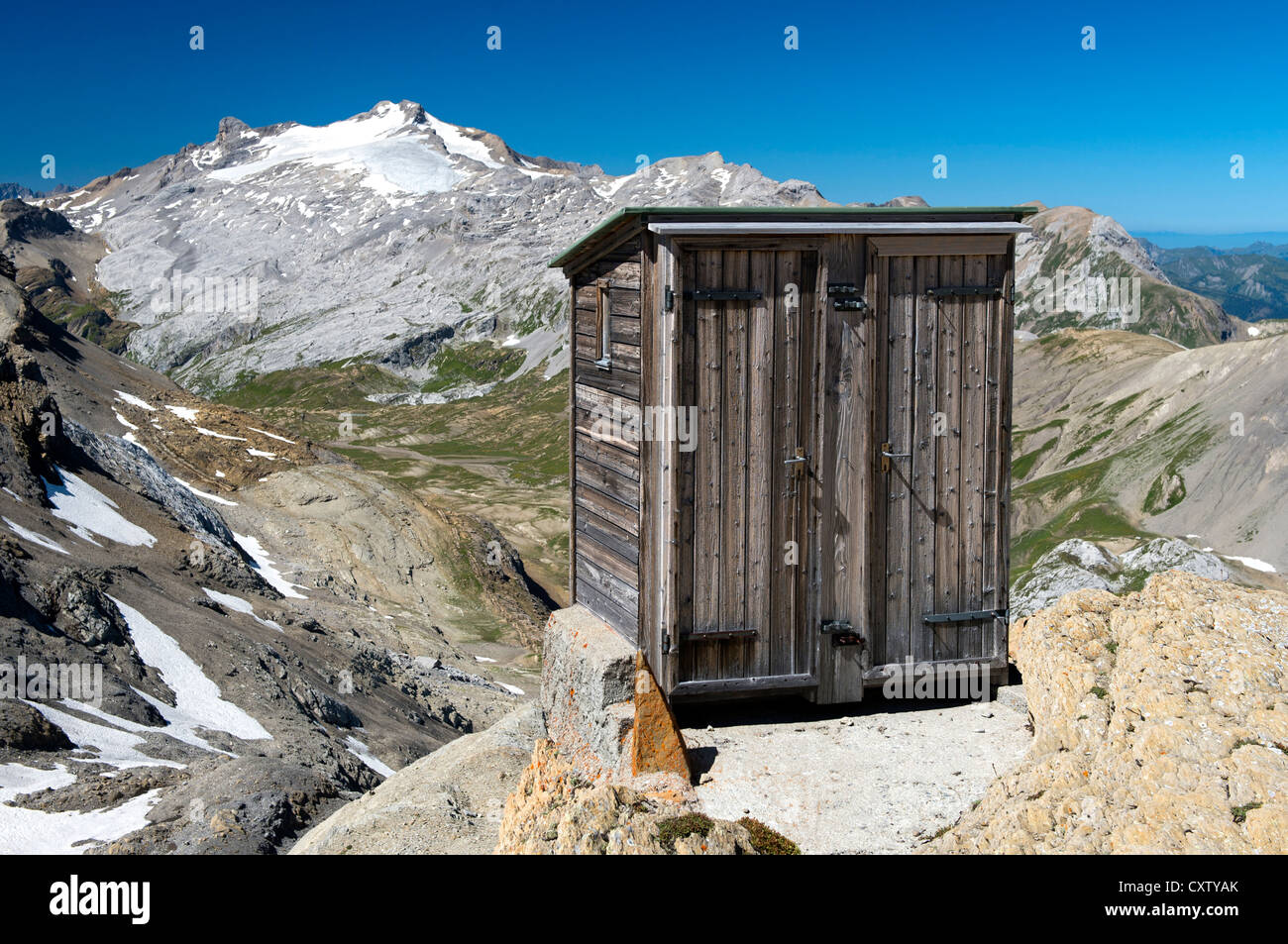 Former toilet house of the mountain hut Wildstrubelhuette with a great view at Mt Wildhorn, Bernese Alps, Switzerland Stock Photo