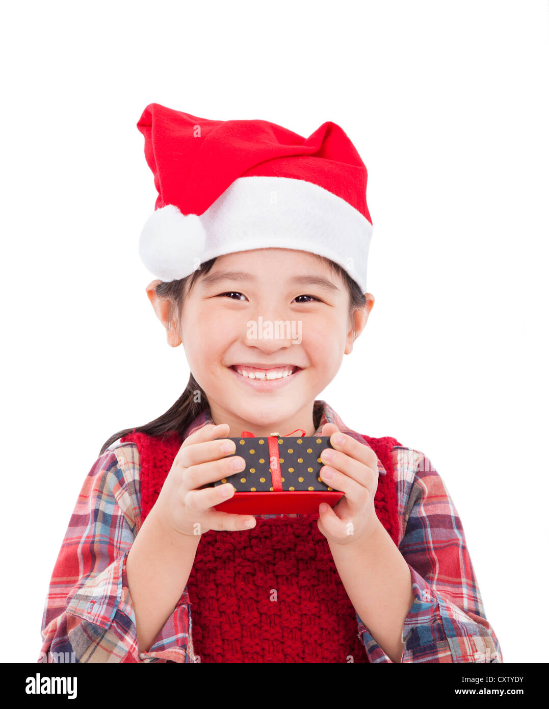 smiling little girl holding christmas gift Stock Photo - Alamy