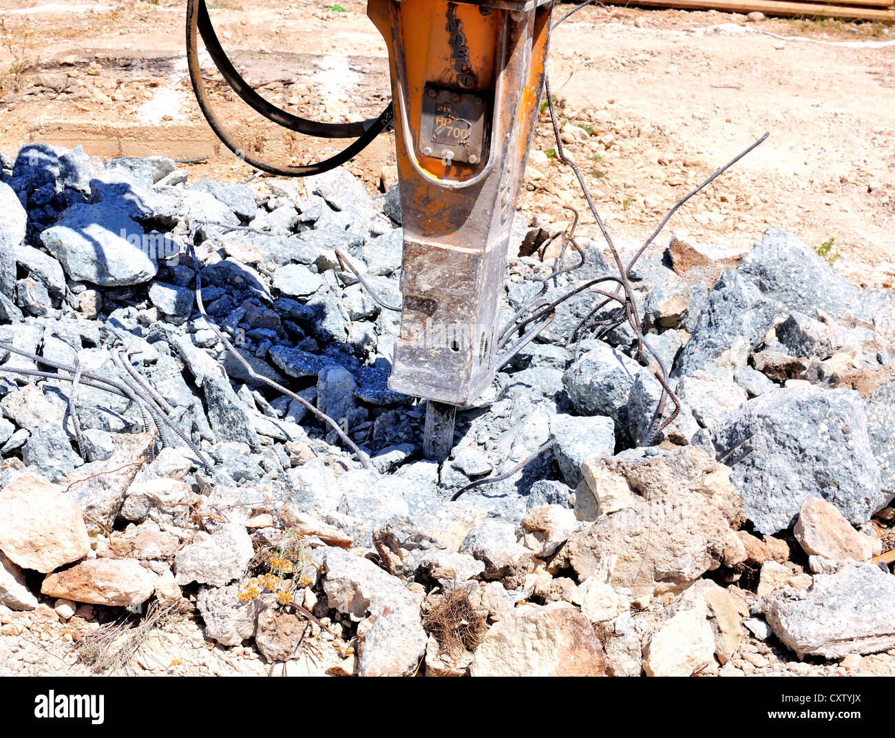 Excavator with hammer Stock Photo Alamy