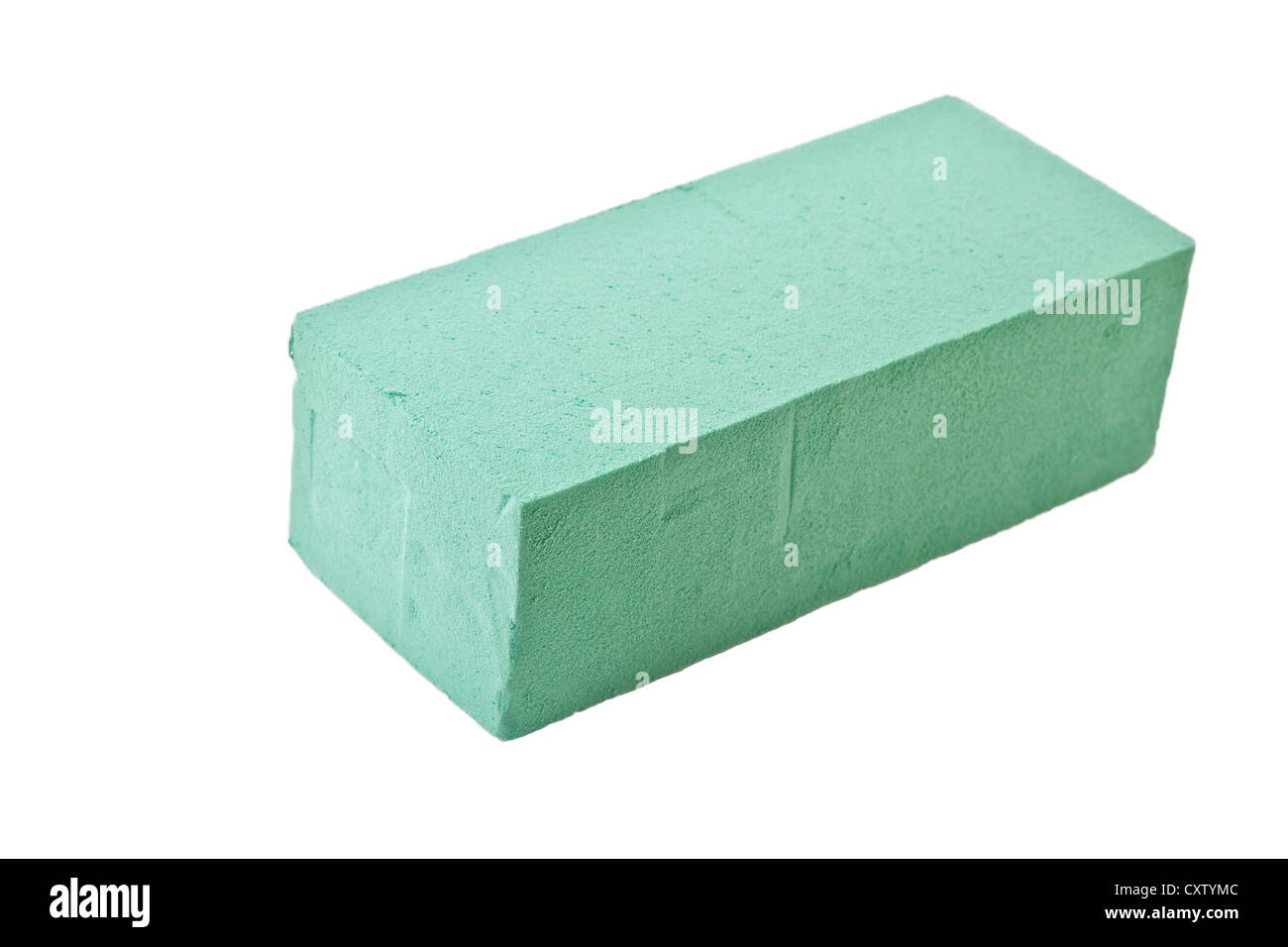 A block (or brick) of wet floral foam used by florist in the construction  of flower arrangements using fresh flowers Stock Photo - Alamy