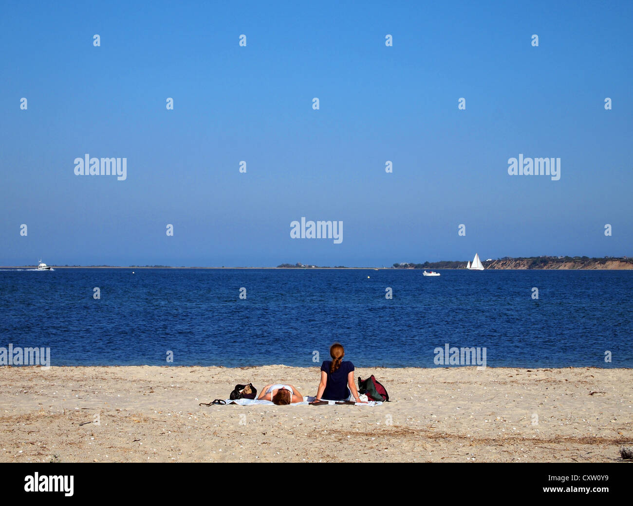 Two women on the beach in Edgartown, Martha's Vineyard, Massachusetts