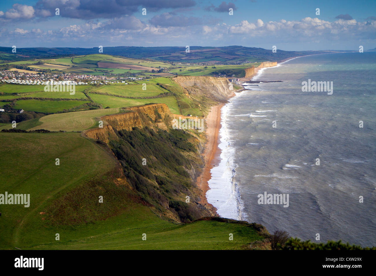 Dorset coast and countryside view towards West Bay and Chesil beach on the Jurassic Coast Stock Photo