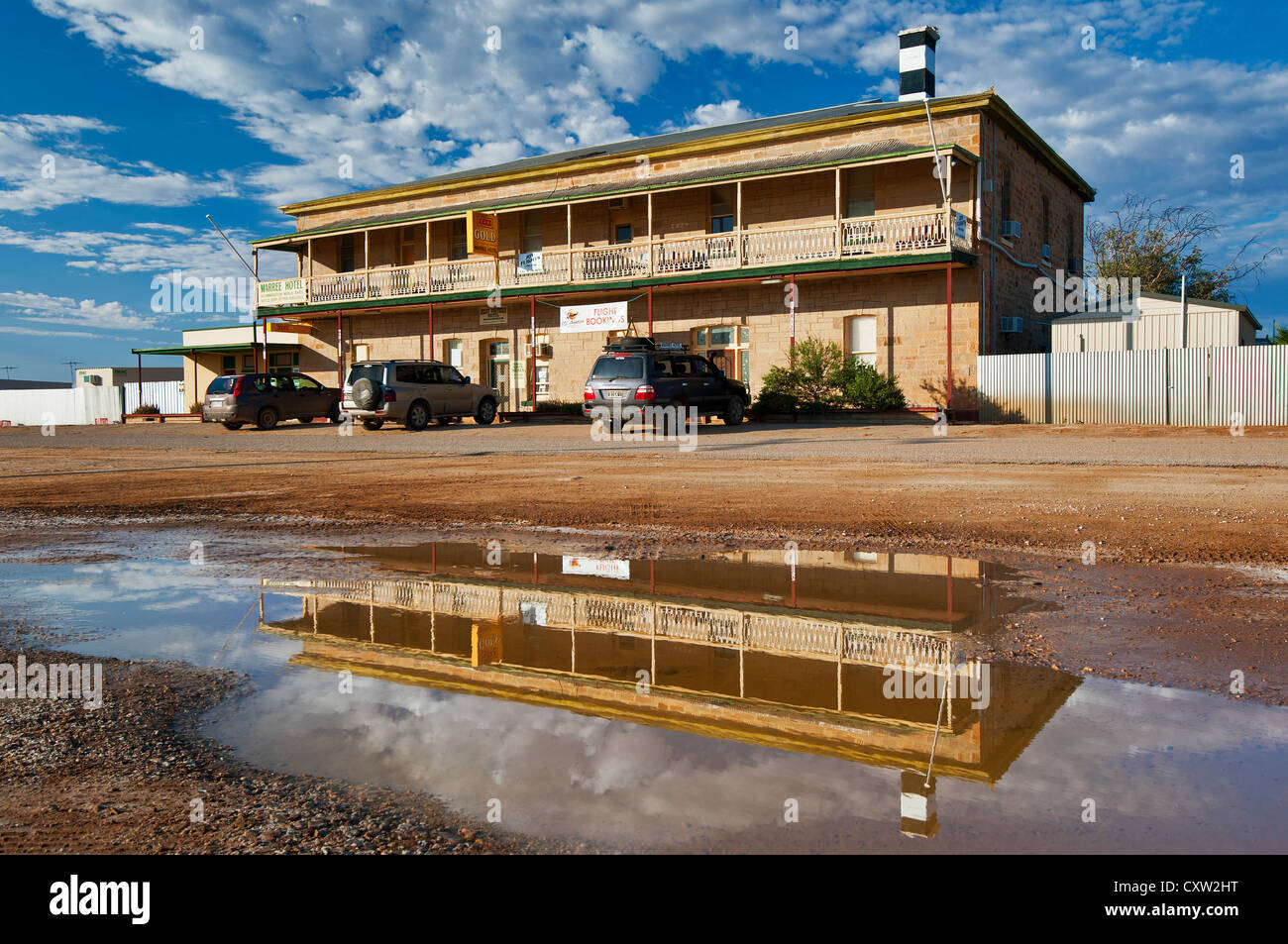 Reflections of remote Marree Hotel in the desert of South Australia. Stock Photo
