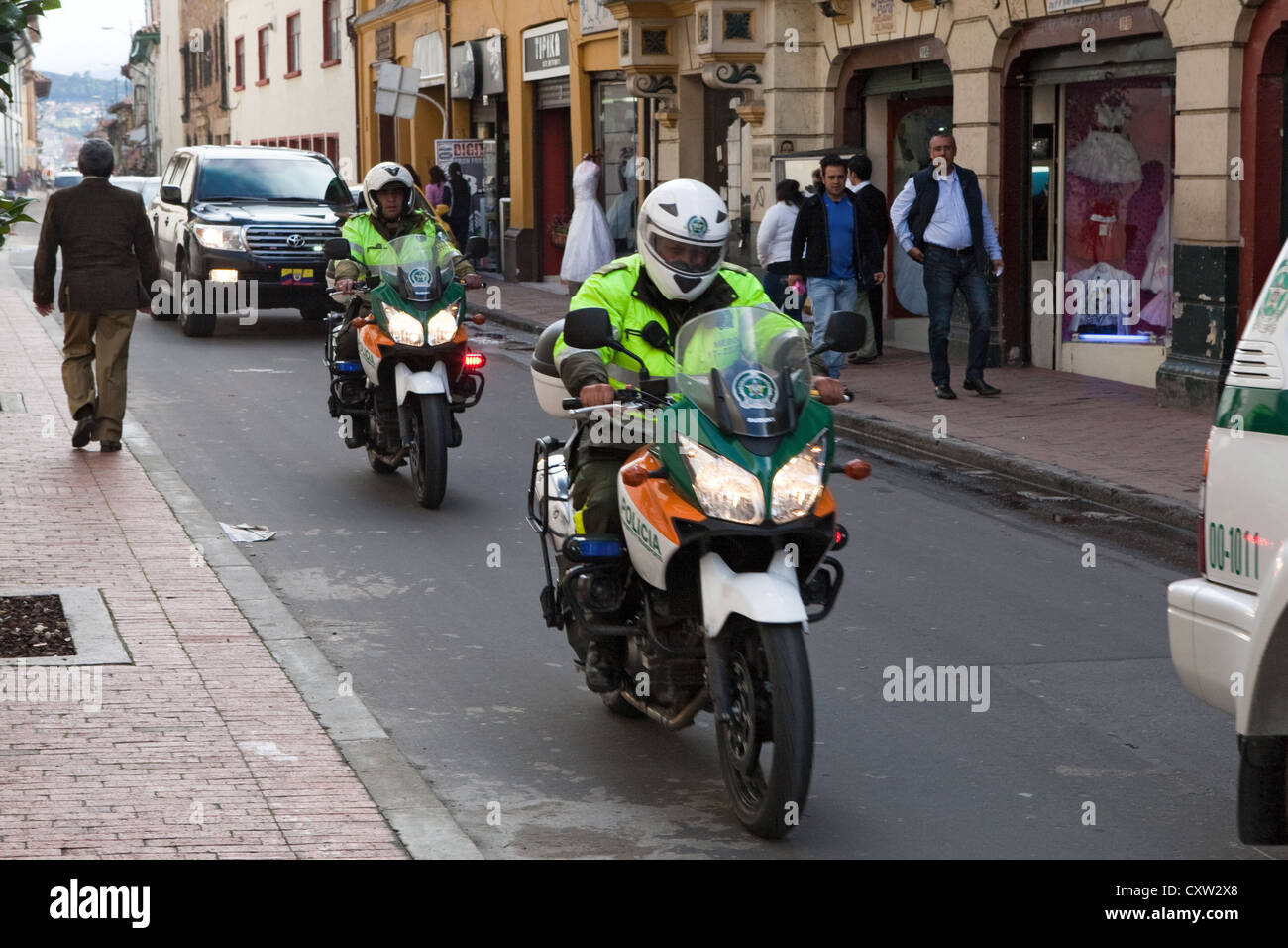 Police escort on bikes & cars, La Candelaria, Bogota, Colombia Stock Photo Alamy