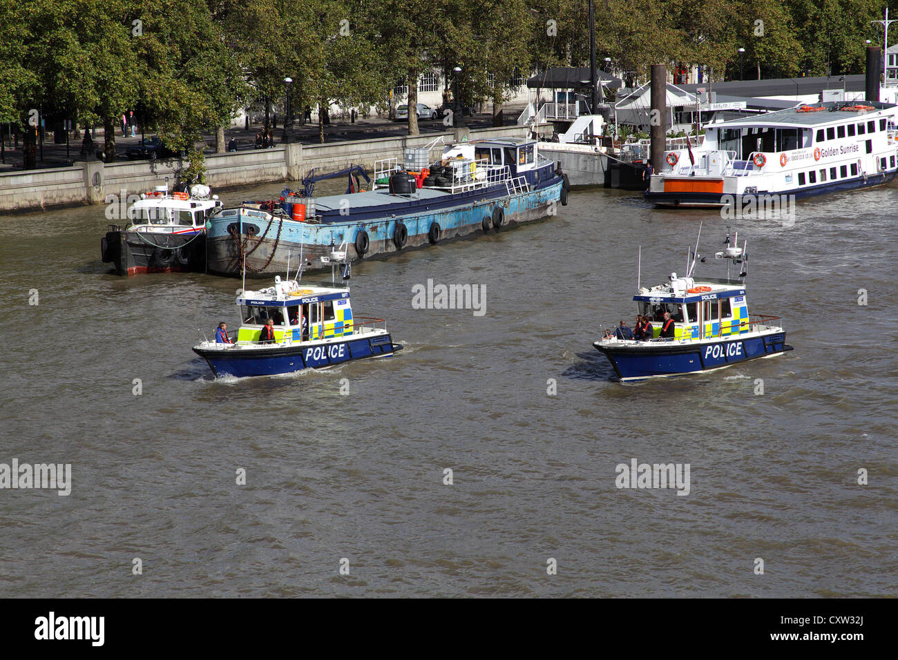 Police boats on patrol on the River Thames in London Stock Photo Alamy