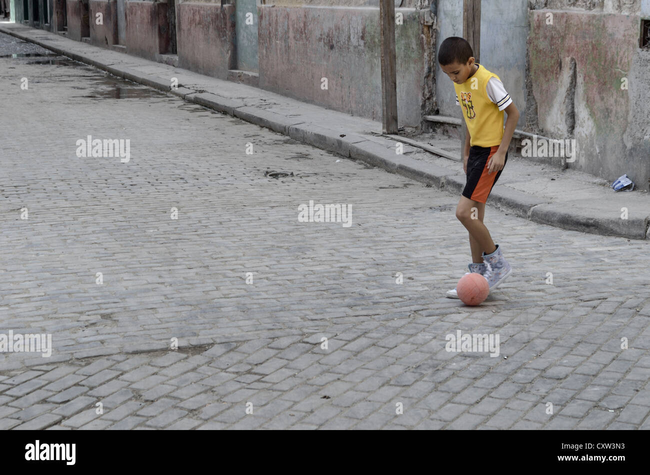 Boy in back street in Havana, Cuba Stock Photo
