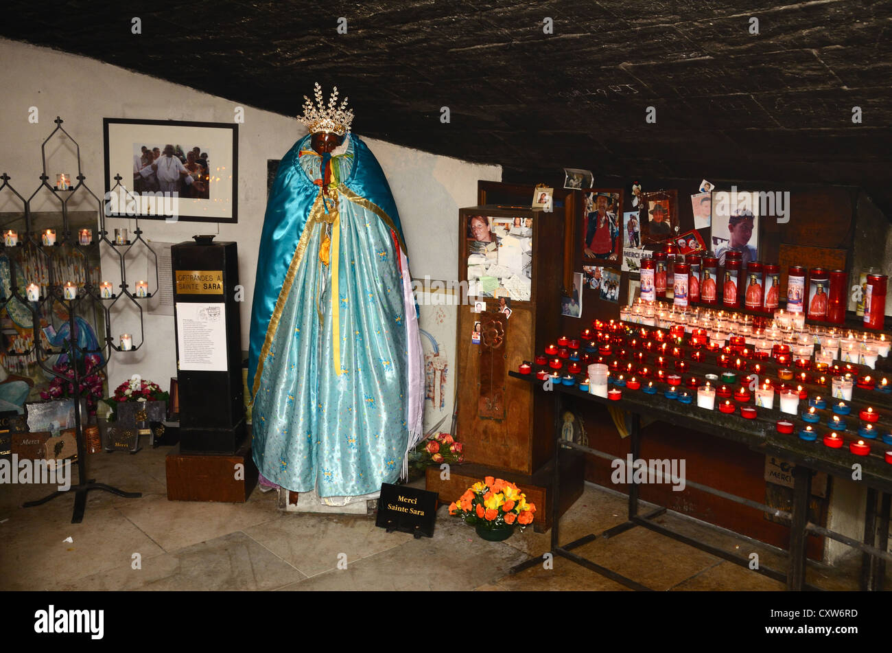 Saint Sarah Statue, Shrine & Offerings in the Crypt of the Fortified Church at Les Saintes-Maries-de-la-Mer Camargue Provence France Stock Photo