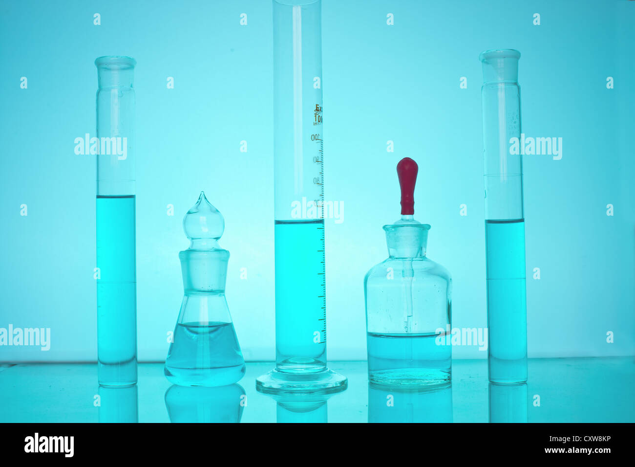 Laboratory glassware with various colored liquids Stock Photo Alamy
