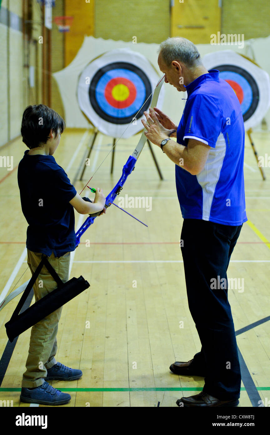 Archers practice during club night. Stock Photo