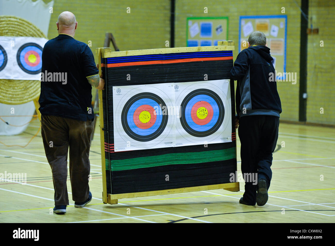 Archers practice during club night. Stock Photo