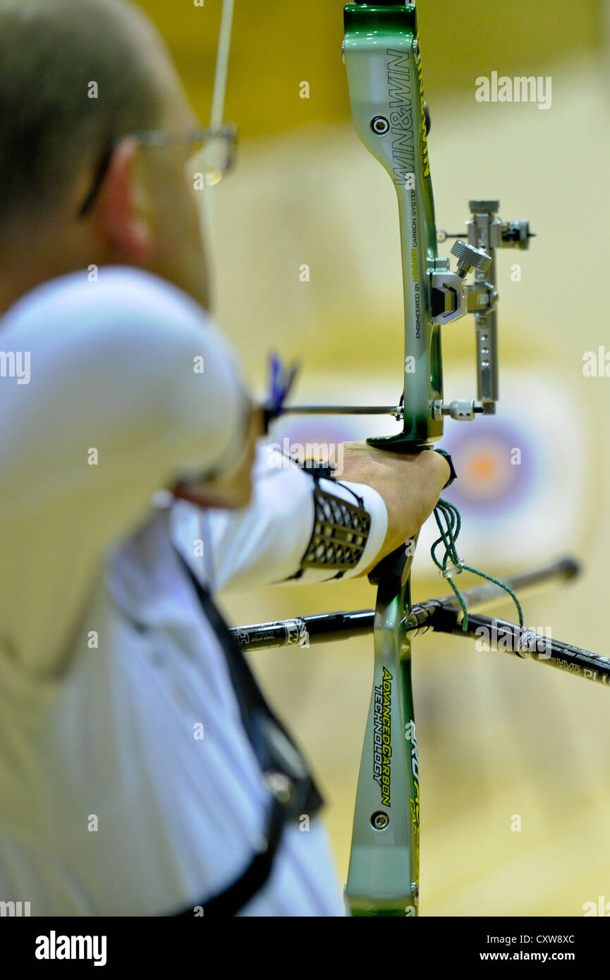 Archers practice during club night. Stock Photo