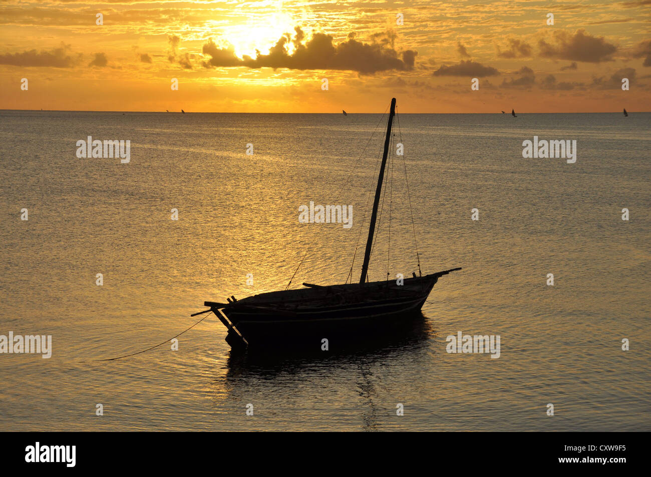 Early morning, Mocimboa da Praia, Mozambique - On the horizon dhows sail north, a few will make their way to Tanzania. Stock Photo