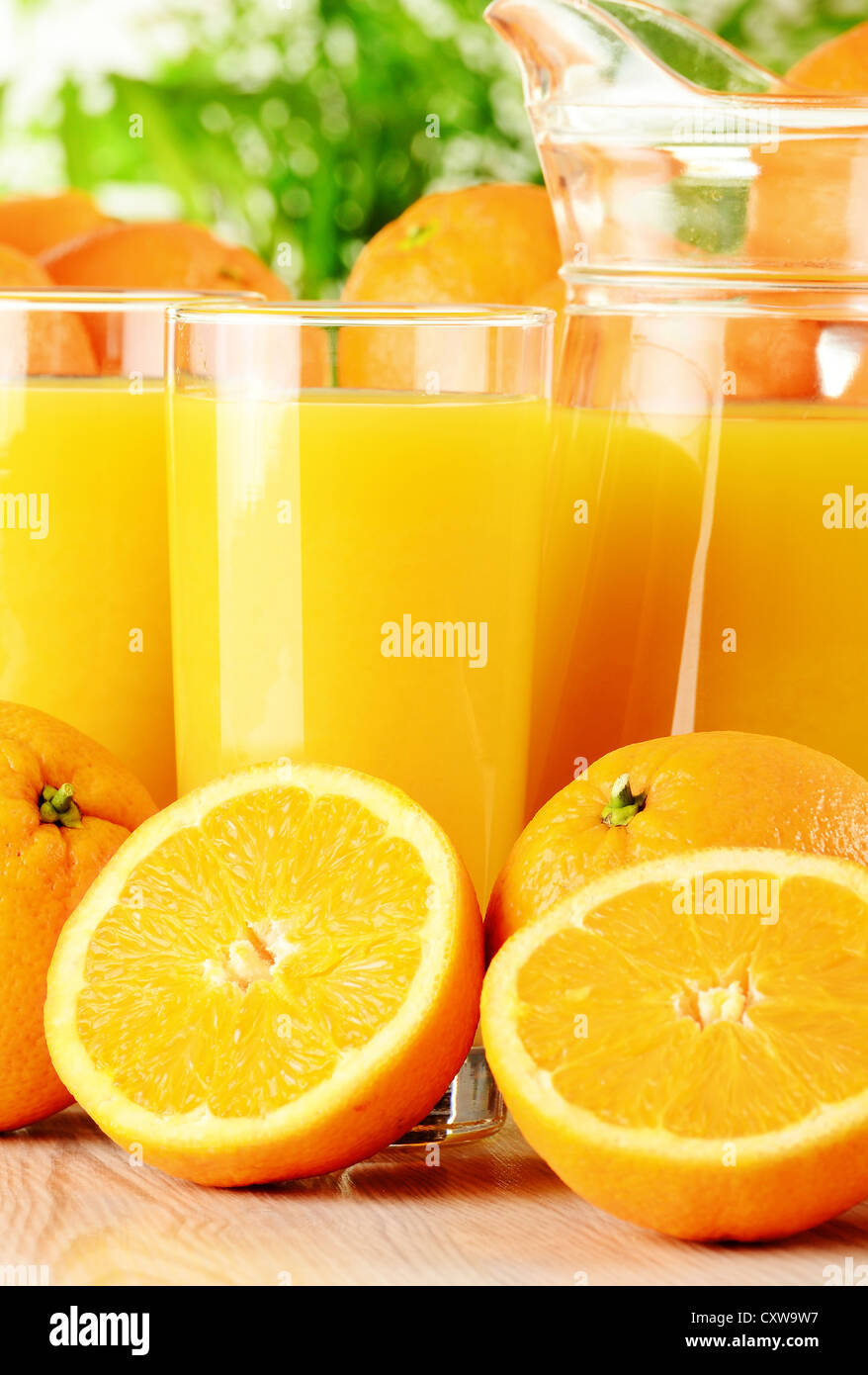 Glasses of orange juice and fruits Stock Photo Alamy