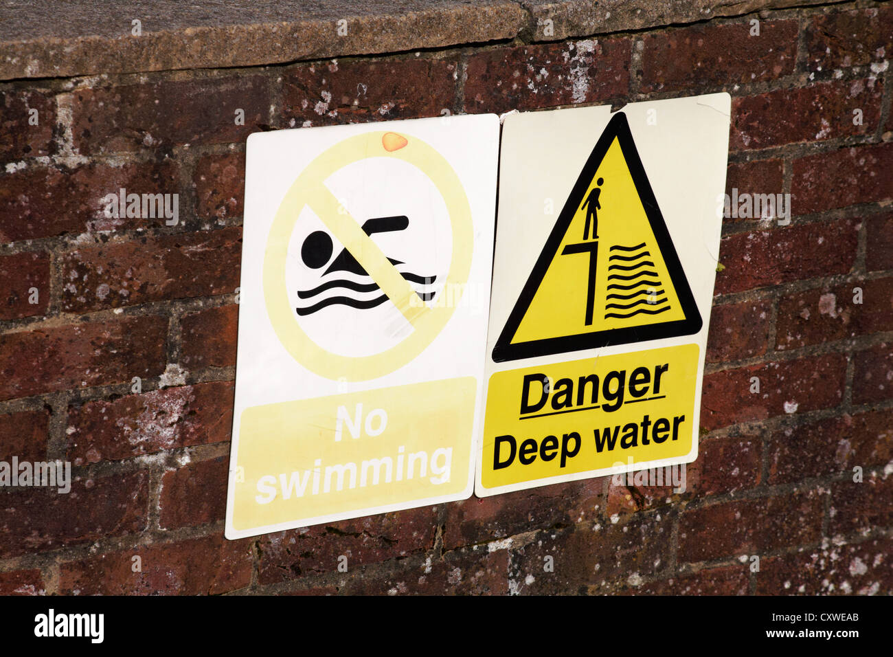 No swimming and danger deep water signs in Hampshire UK Stock Photo