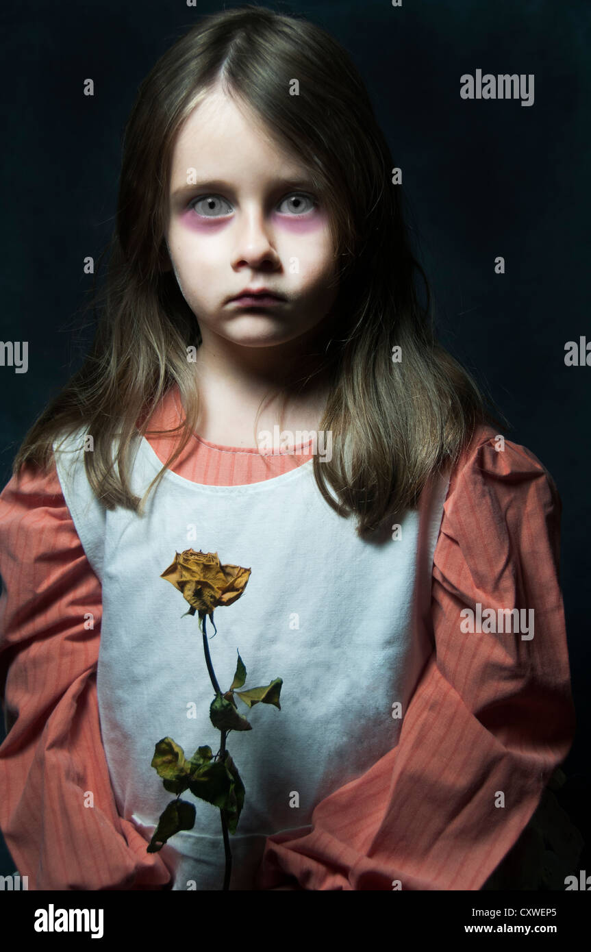 A model released image of a young Girl, posing as a ghostly figure Stock Photo
