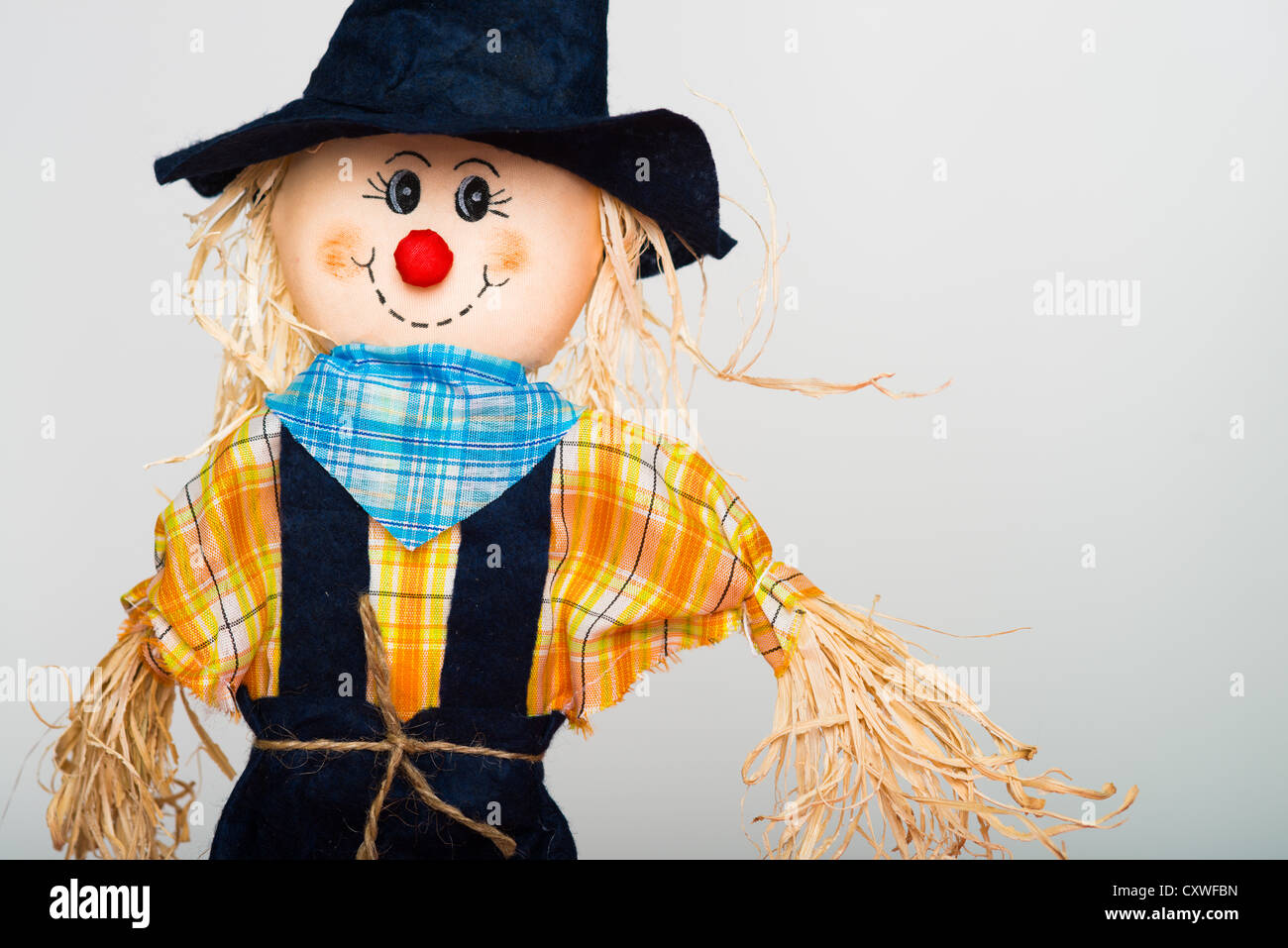 Halloween straw scarecrow doll Stock Photo - Alamy