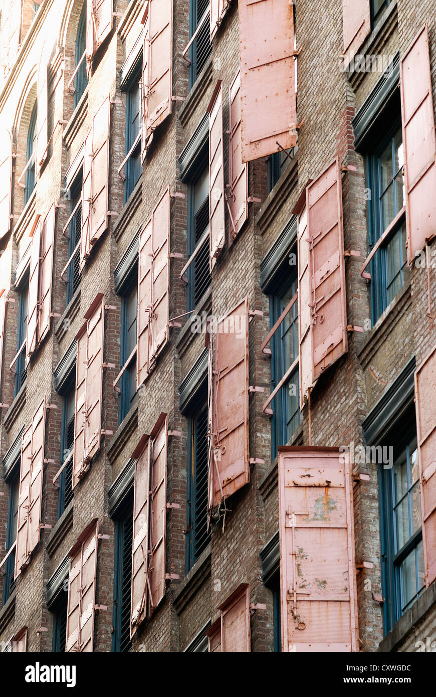 Storm shutters on a building in SoHo, New York Stock Photo