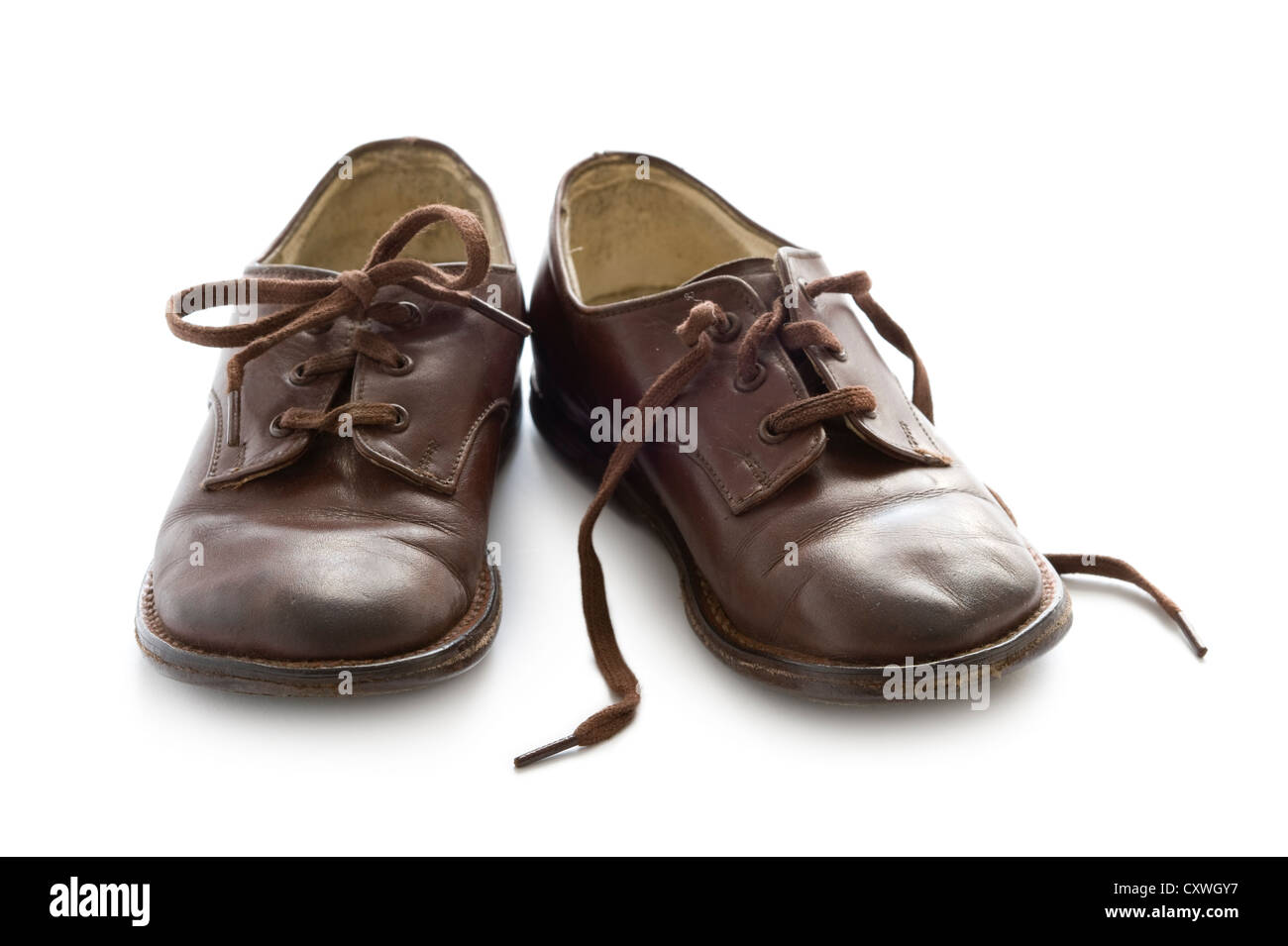 a pair of vintage childs brown leather school shoes isolated Stock Photo