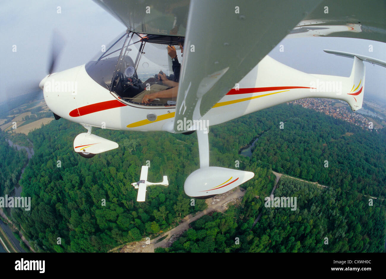 Two ultralight planes Allegro flying over Alsace region, France Stock Photo