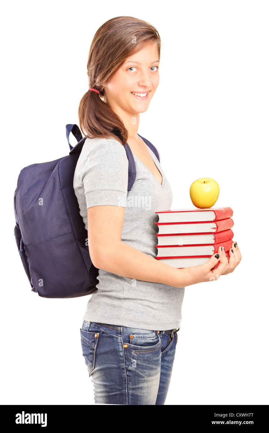 Schoolgirl with books isolated on a white background Stock Photo - Alamy
