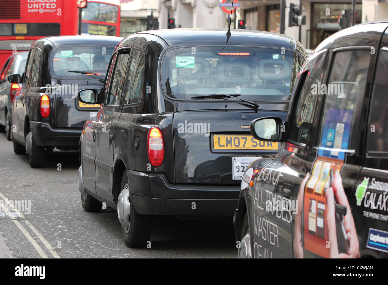 London, Londra, U.K., europe, taxi's in a line, traffic, street, photoarkive Stock Photo