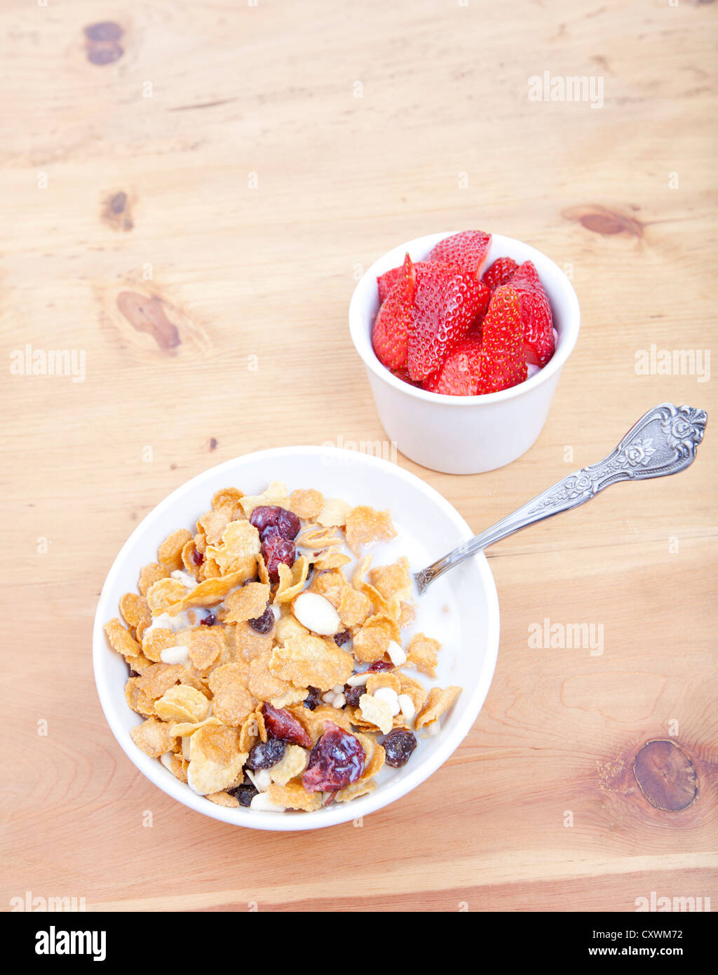 Bowl of cereal with strawberries Stock Photo