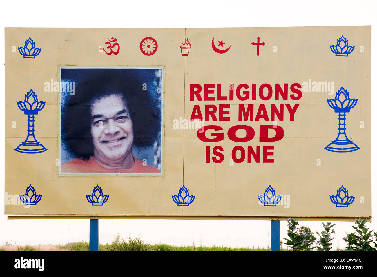 Religions are many, God is one sign. Sathya Sai Baba. Puttaparthi, Andhra Pradesh, India Stock Photo