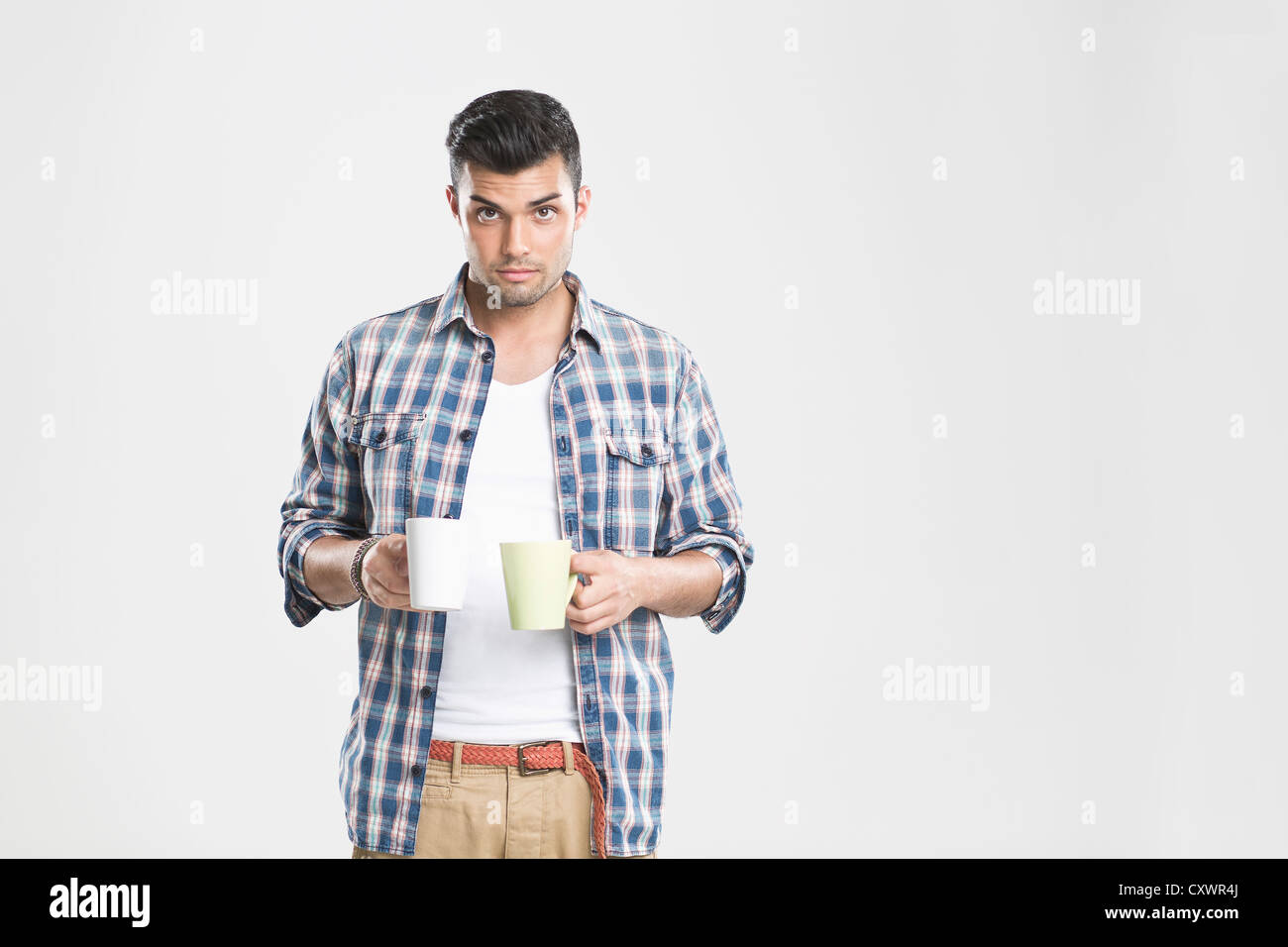 Man holding cups of coffee Stock Photo