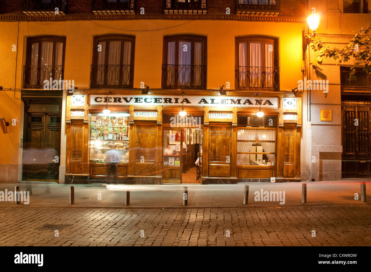 Facade of Cervecería Alemana, night view. Santa Ana Square, Madrid, Spain. Stock Photo