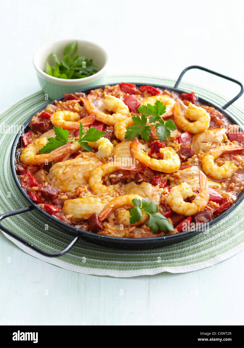 Dish of chicken and shrimp paella Stock Photo