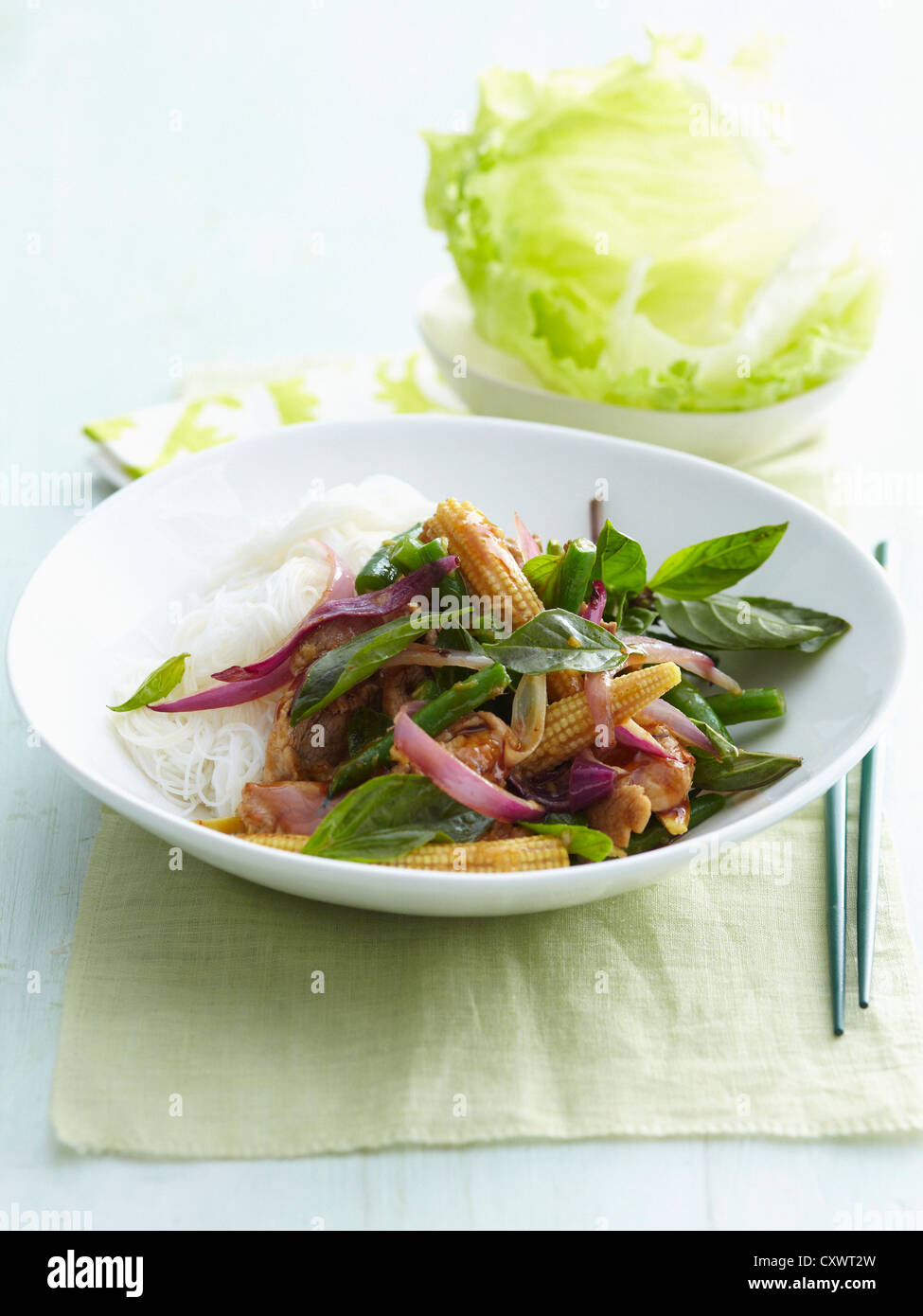 Plate of baby corn, herbs and rice Stock Photo