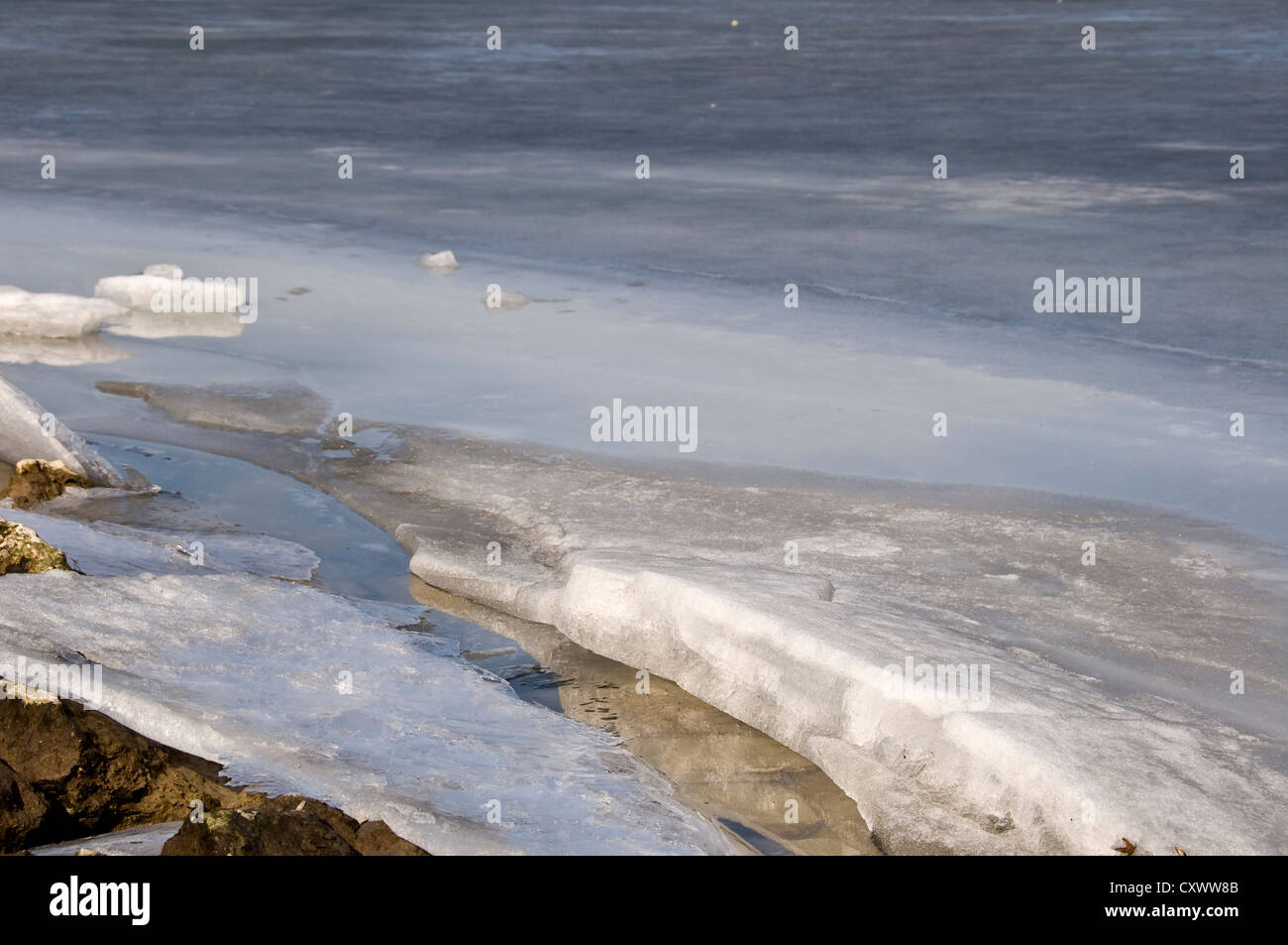 Shore of a frozen lake - France Stock Photo
