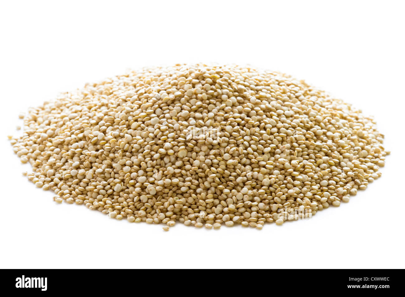 quinoa grains in a heap isolated on a white background Stock Photo