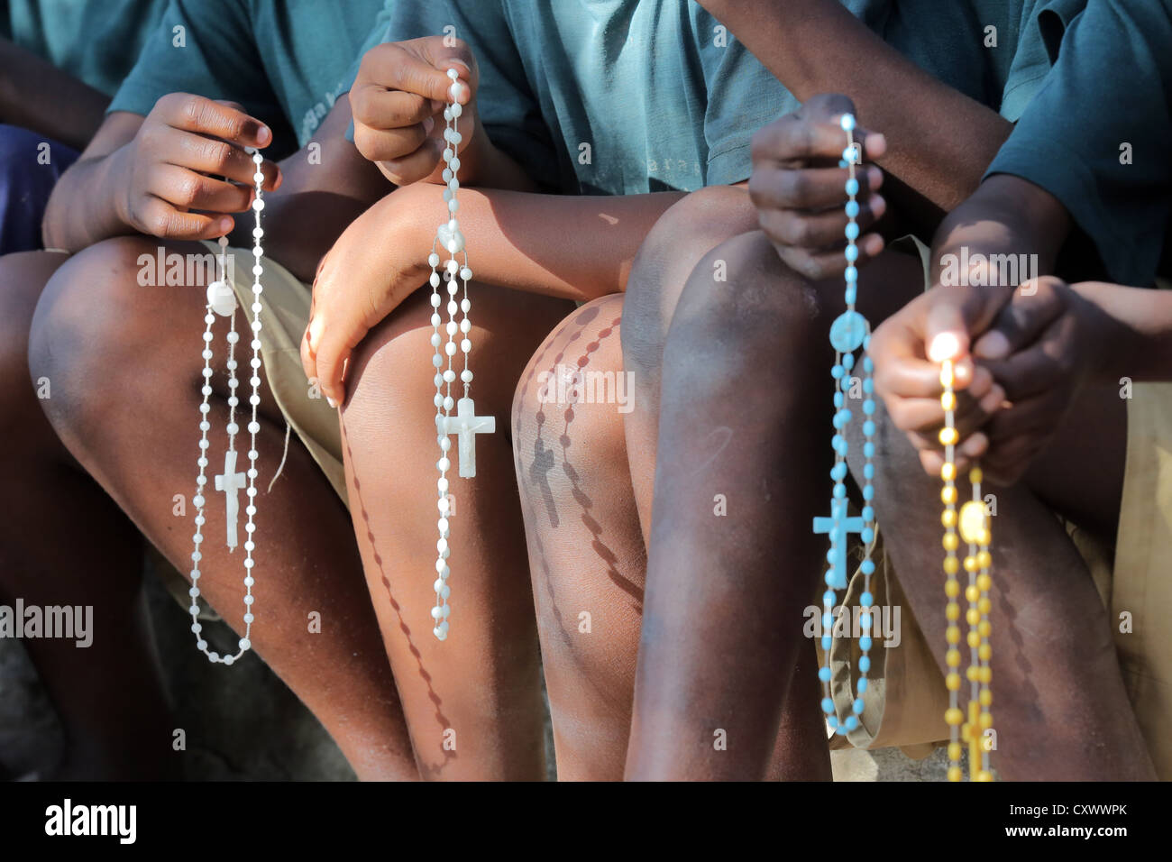 Sunday school, roman catholic children praying the rosary, Tanzania Stock Photo