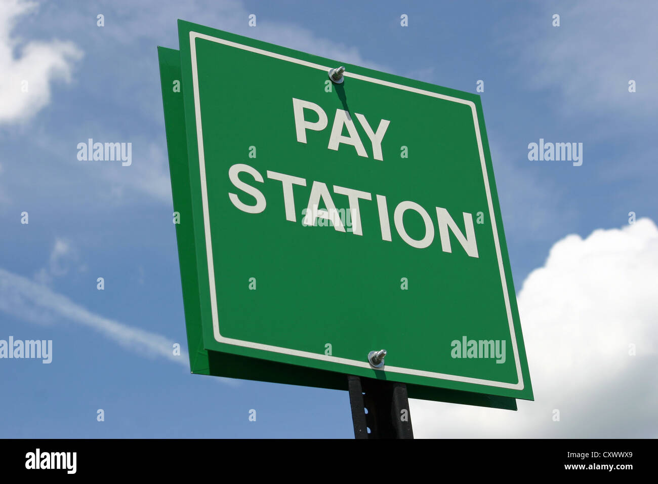 A green sign that reads Pay Station Stock Photo