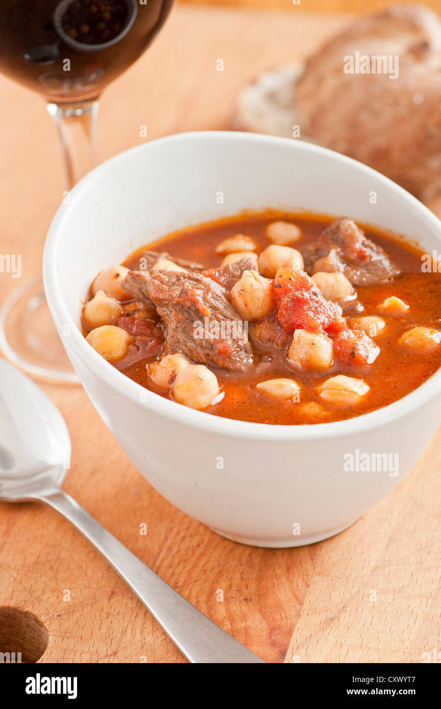 Serving of spicy chilli dish with meat and chickpeas Stock Photo
