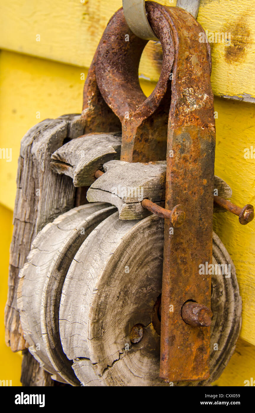 Rusty Hanging Rope Pulley Stock Photo Alamy